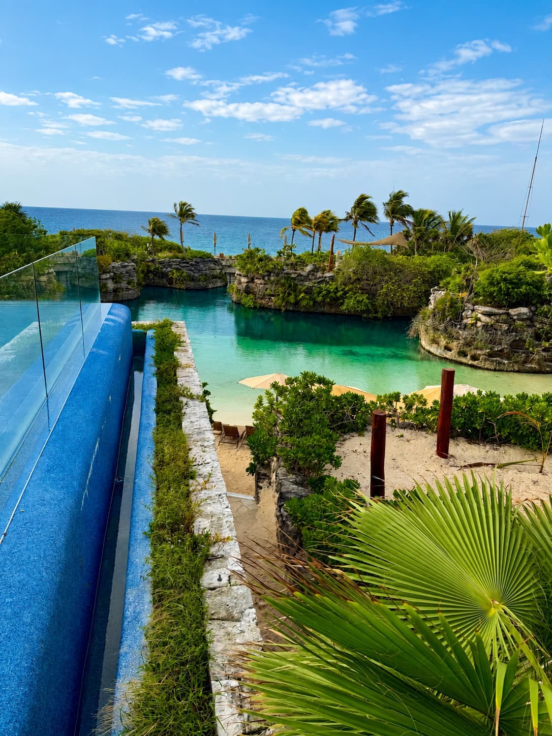 The river inlet meeting the Caribbean at Hotel Xcaret México, July 2026